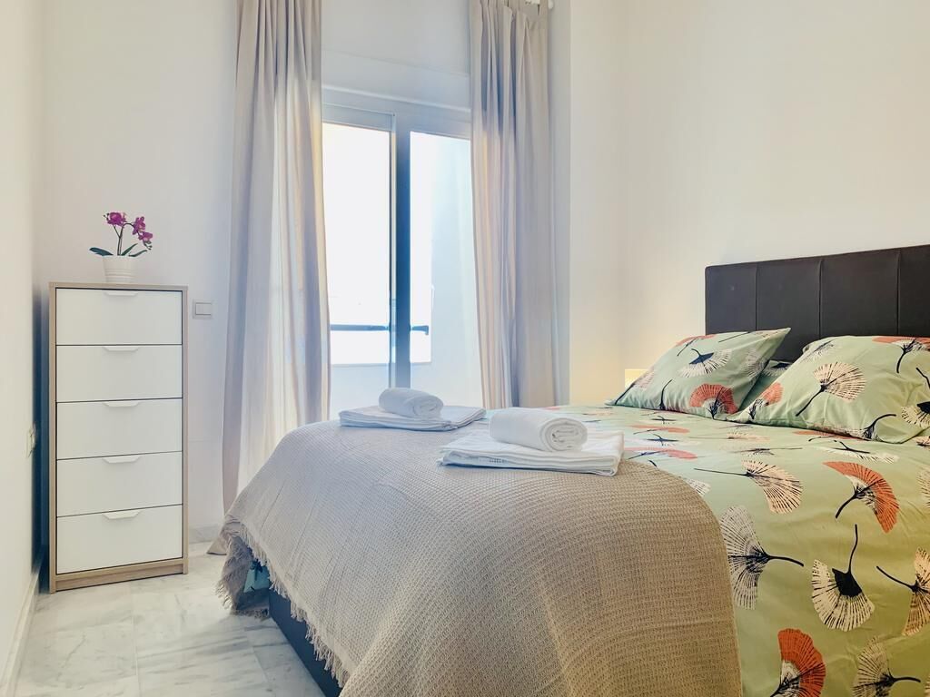 1 slaapkamer, een strijkplank/strijkijzer