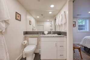 Combined shower/bathtub, hair dryer, towels, soap