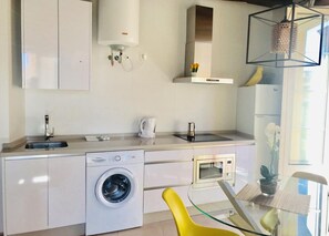 Fridge, oven, electric kettle, toaster