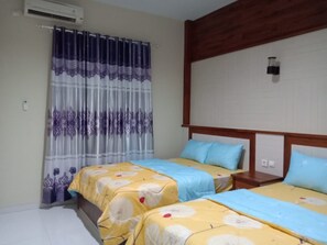 Bungalow | Minibar, desk, bed sheets - Hotel Abad Baru 1 (Pangandaran)