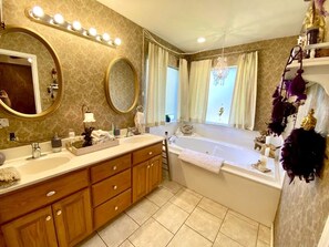 Bathtub, hair dryer, towels, soap