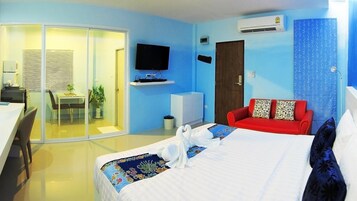 Habitación Deluxe | Escritorio, wifi gratis, ropa de cama