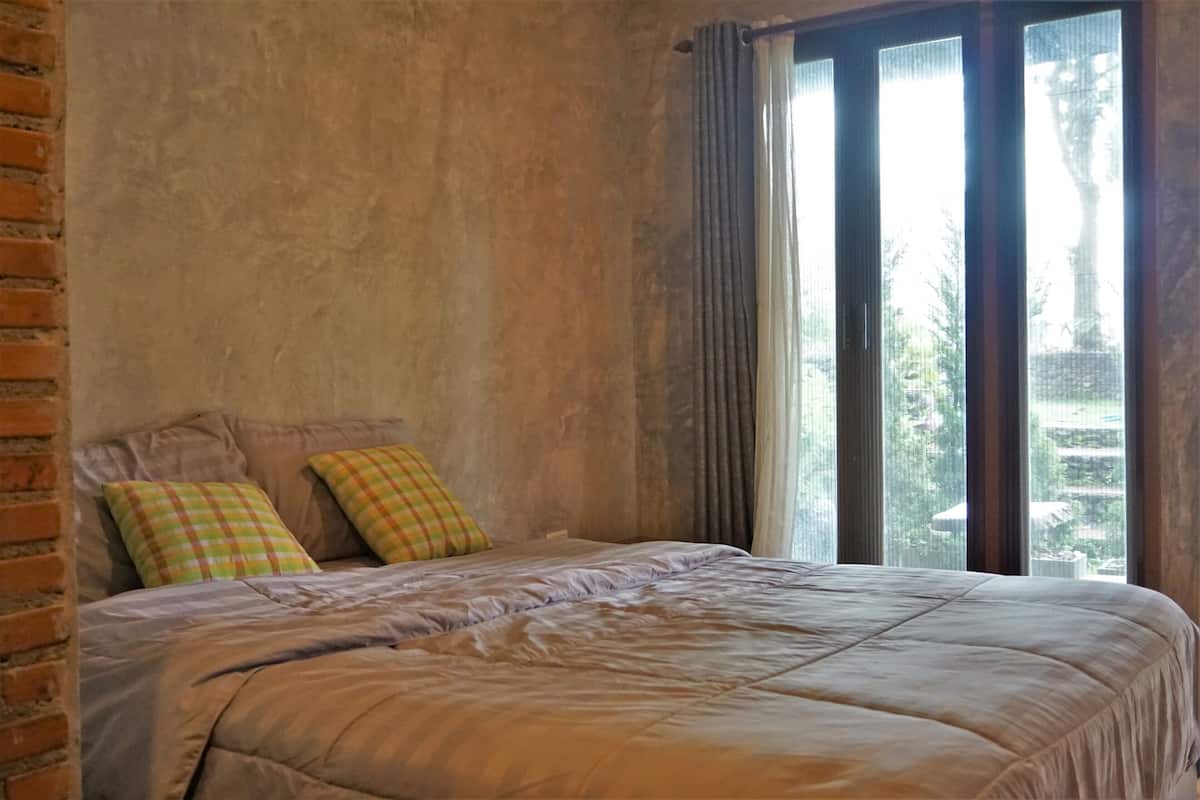 Double Room With Fan Garden view | Laptop workspace, WiFi (free), bed sheets