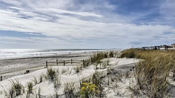 On the beach, sun-loungers