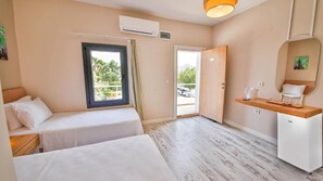 Desk, laptop workspace, free WiFi, bed sheets
