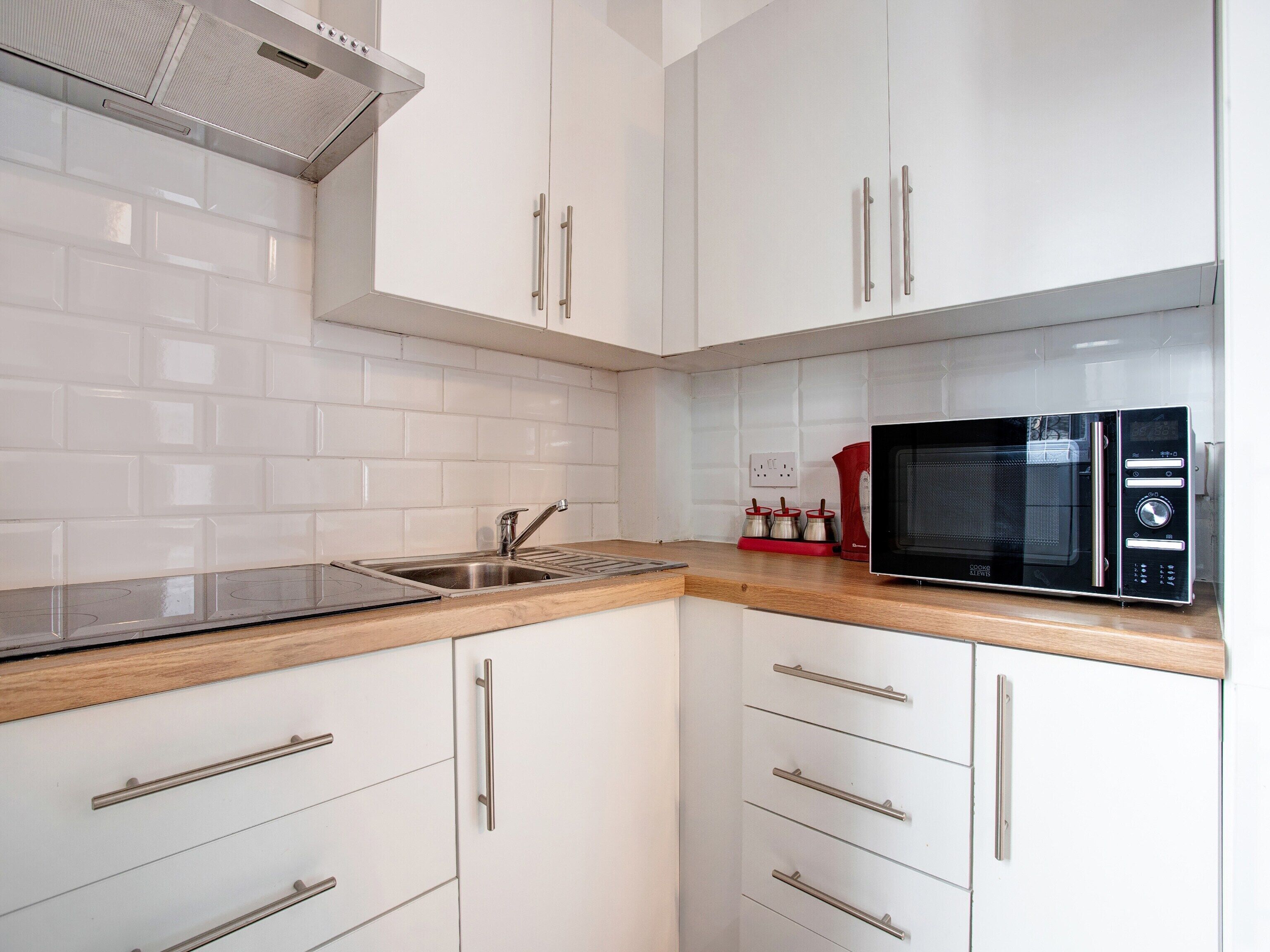 Mini-fridge, coffee/tea maker, electric kettle, toaster