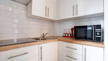 Mini-fridge, coffee/tea maker, electric kettle, toaster