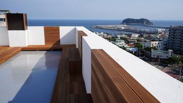 Premium bedding, down comforters, blackout drapes, soundproofing