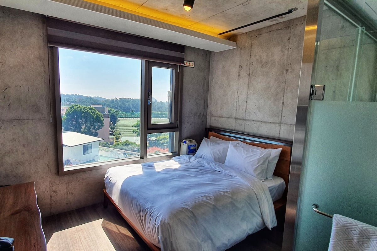 Premium bedding, down comforters, blackout drapes, soundproofing