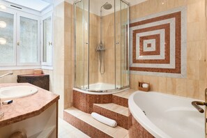 Bathtub, hair dryer, towels, soap