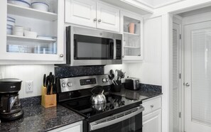 Fridge, microwave, coffee/tea maker, toaster