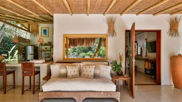 Exclusieve bungalow, 1 kingsize bed, uitzicht op tuin, aan tuin | Woonruimte | Flatscreentelevisie