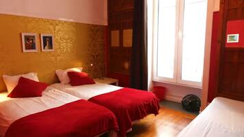 Triple Room, City View | Hypo-allergenic bedding, individually decorated, blackout drapes