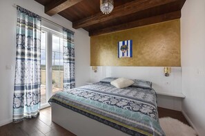 2 slaapkamers, een strijkplank/strijkijzer, gratis wifi, beddengoed
