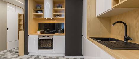Departamento de lujo | Cocina privada | Refrigerador, horno, parrilla de estufa y lavavajillas