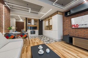 Luxury Apartment | Living area | Flat-screen TV - P&O Apartments Cybernetyki 6 (Warsaw)