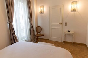 1 غرفة نوم ومكواة/لوح كي وواي فاي وملاءات أسرّة