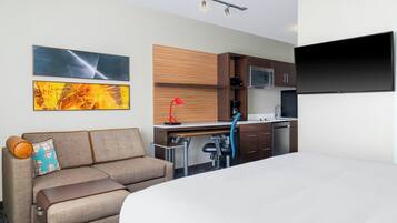 Studio, 1 trÚs grand lit et 1 canapé-lit