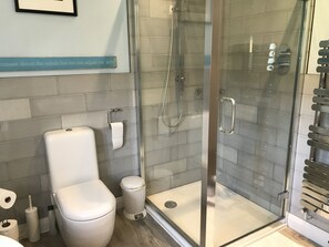 Bathtub, hair dryer, towels