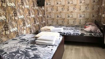 Chambre Quadruple Supérieure | 1 chambre, literie de qualité supérieure, matelas mémoire de forme