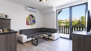 Cartoon Apartment (15) | Living room | 102-cm LCD TV with digital channels, TV