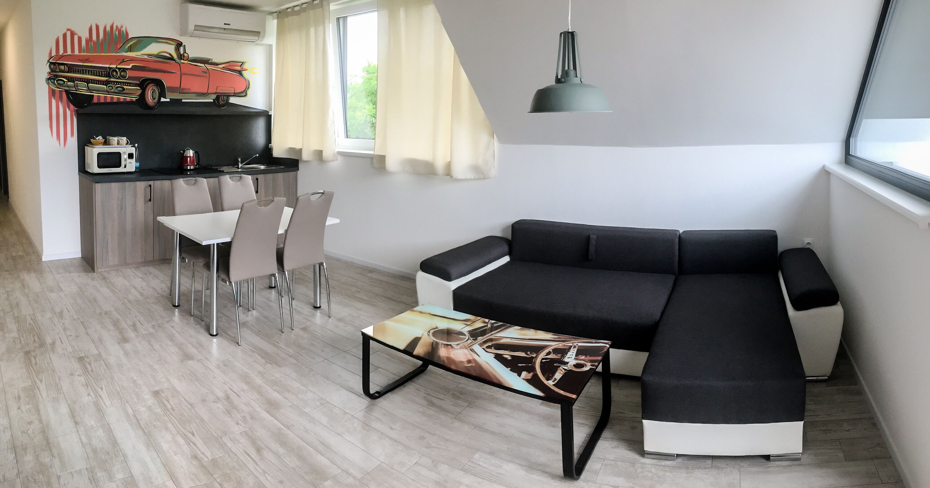 Cadillac Apartment | Living area | 102-cm LCD TV with digital channels, TV