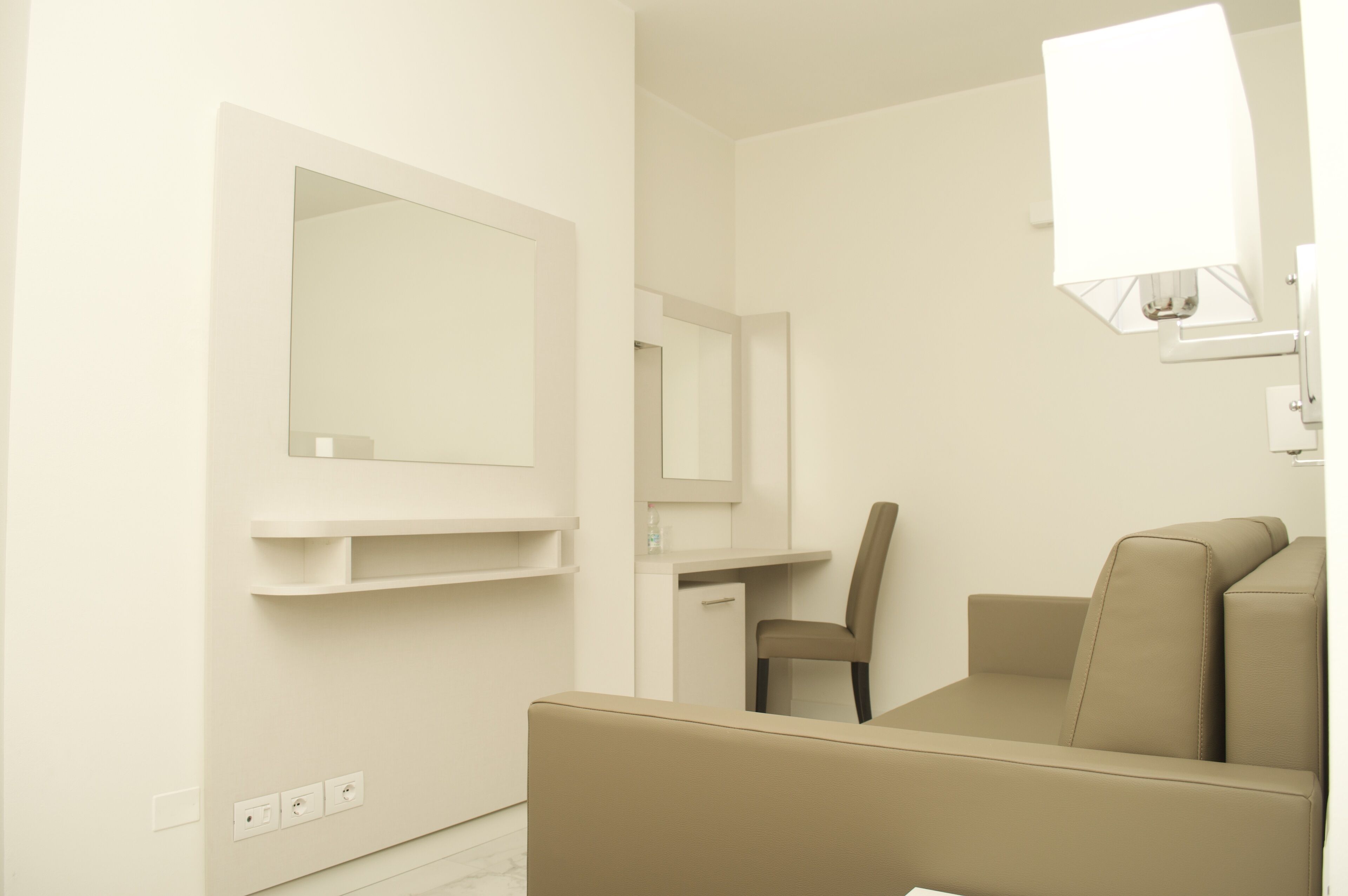 suite deluxe isola maggiore | premium bedding, minibar, desk, laptop workspace