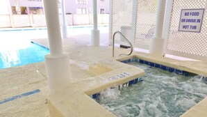 A hot tub area with a sign prohibiting food or drink. - Cozy 2 bed 2 bath in Arcadian Dunes (Myrtle Beach)
