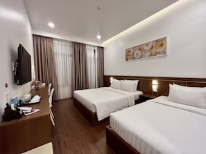 Deluxe Family Room | Premium bedding, minibar, desk, laptop workspace - Marina Hotel (Tuy Hoa)