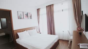 Premium bedding, minibar, desk, laptop workspace