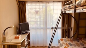 A compact room with a bunk bed, a desk with a laptop, a chair, and an air conditioning unit. - Ichijyo-IVY Bunk bed twin (Kyoto)