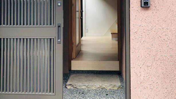 A traditional Japanese entrance with a sliding door and a small wooden step leading inside. - Ichijyo PREMIUM (Kyoto)