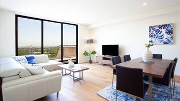 Superior Apartment, 3 Bedrooms | Living area | 42-inch flat-screen TV with digital channels, TV, Netflix