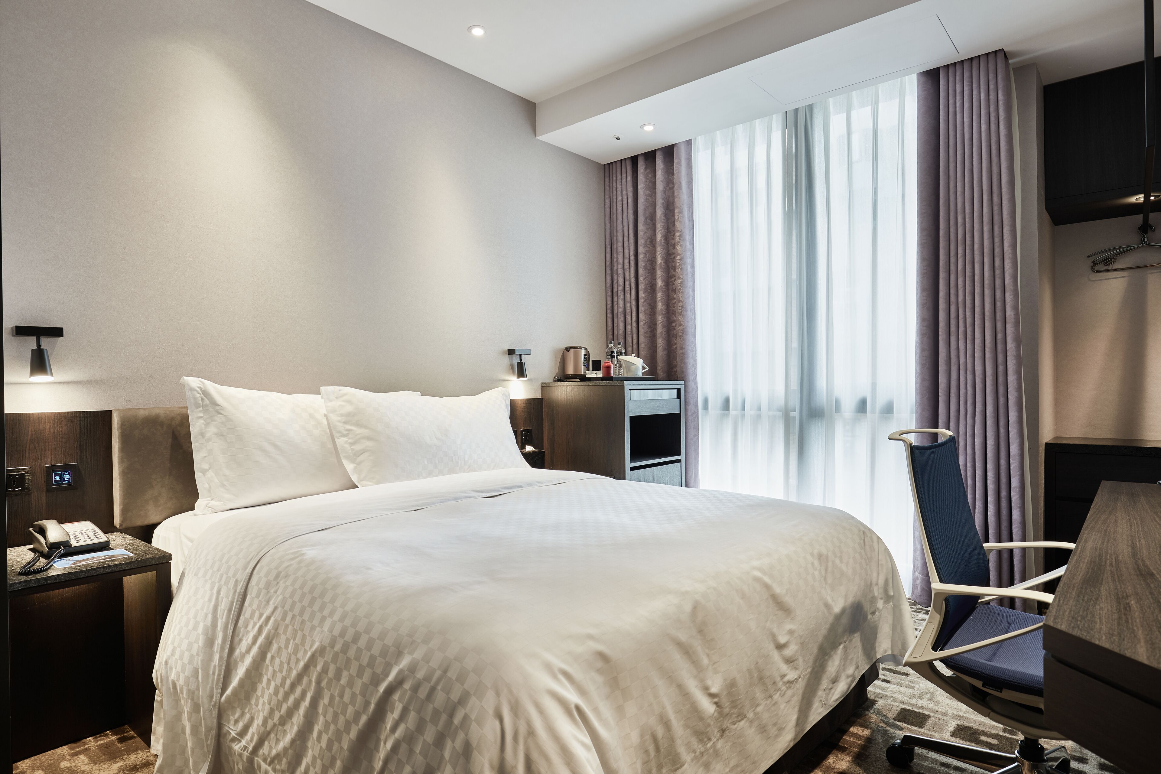 basic room | minibar, in-room safe, desk, blackout curtains