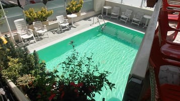 Seasonal outdoor pool, pool umbrellas, sun loungers