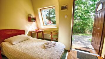 Economy Cabin | Living area | 15-inch TV with cable channels