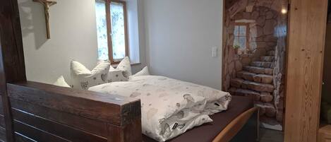 1 غرفة نوم ومكواة/لوح كي وخدمة الإنترنت وملاءات أسرّة