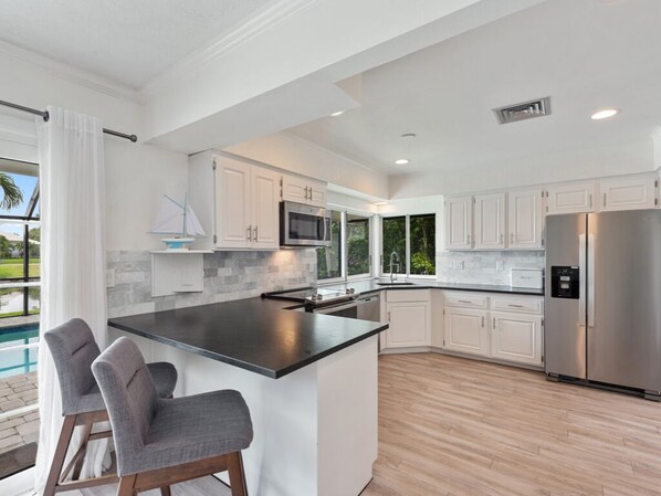 Fridge, microwave, oven, stovetop