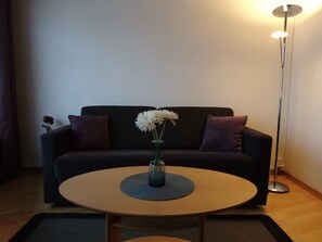 Panoramic Double Room, 1 King Bed with Sofa bed, Sea View | Living area | Heated floors - Arctic Inn (Gratangen)