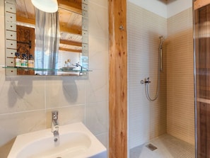 Bathtub, hair dryer, towels, soap
