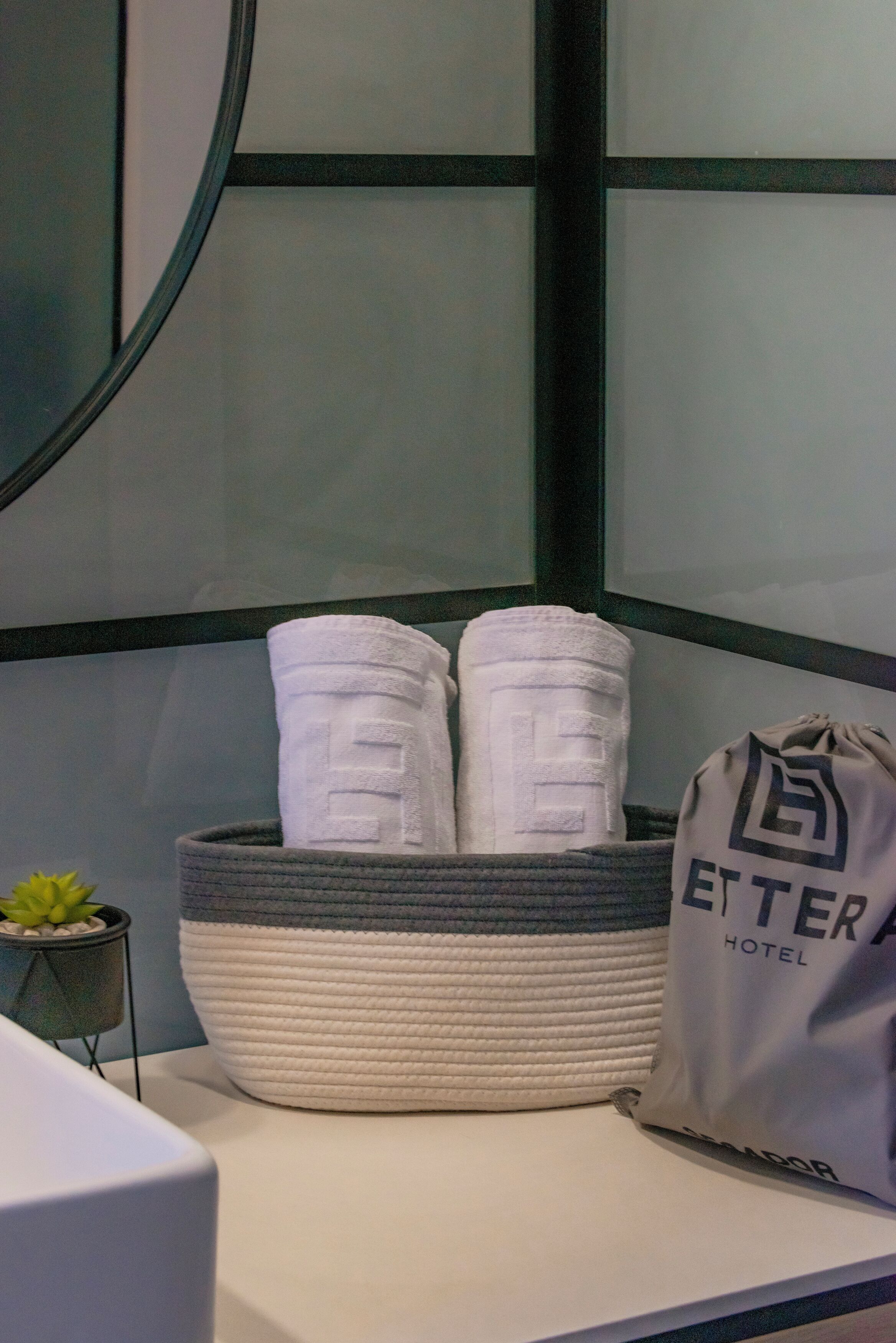 superior twin room | bathroom | shower, hair dryer, towels, soap