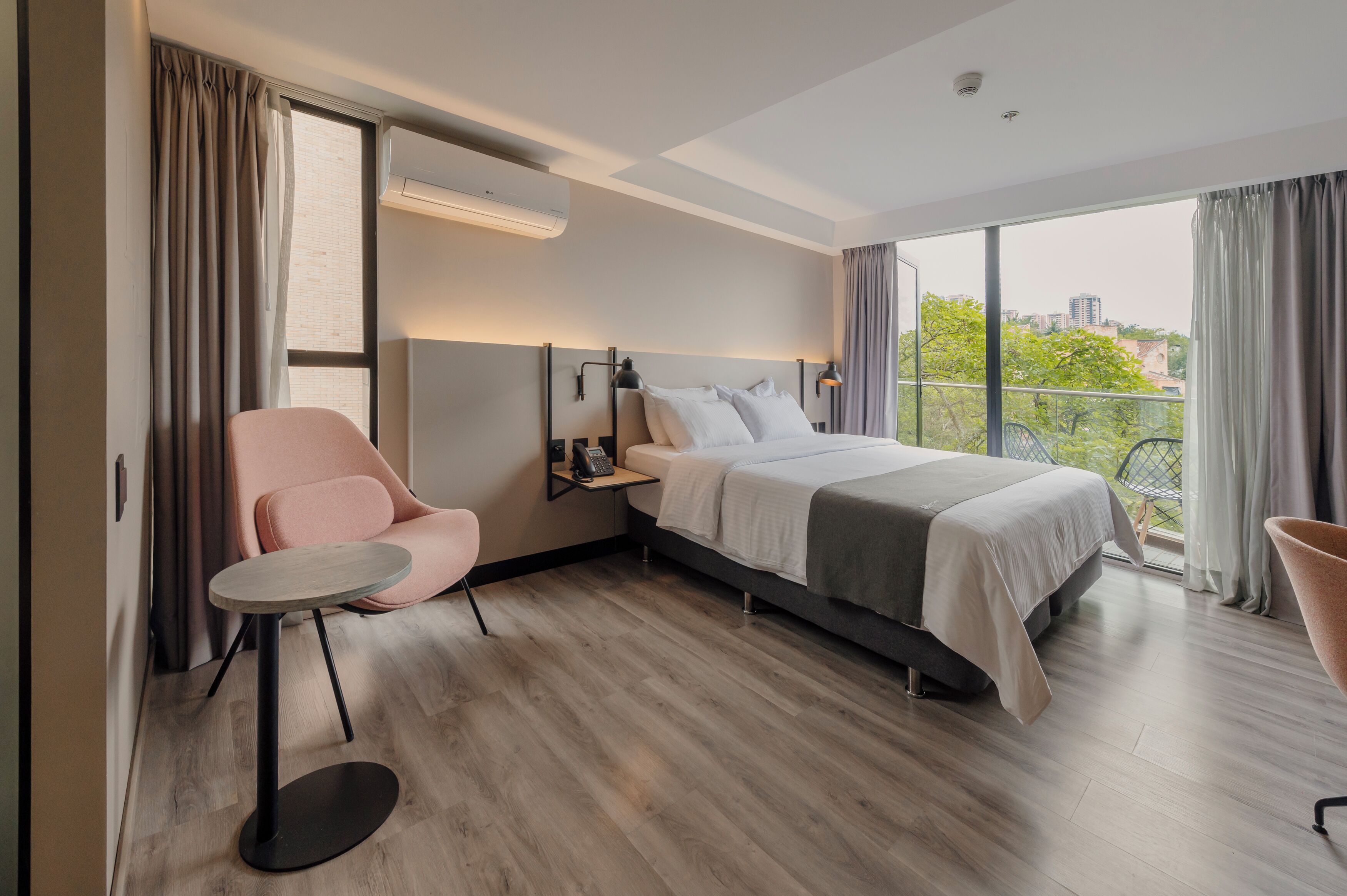 superior double room | in-room safe, desk, laptop workspace, blackout curtains