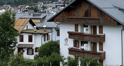 Mansard facing ski slopes and funbob