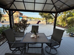 Outdoor dining - Beachside Retreat w/ Pool, Boat Ramp Dock for Rent (Key Largo)