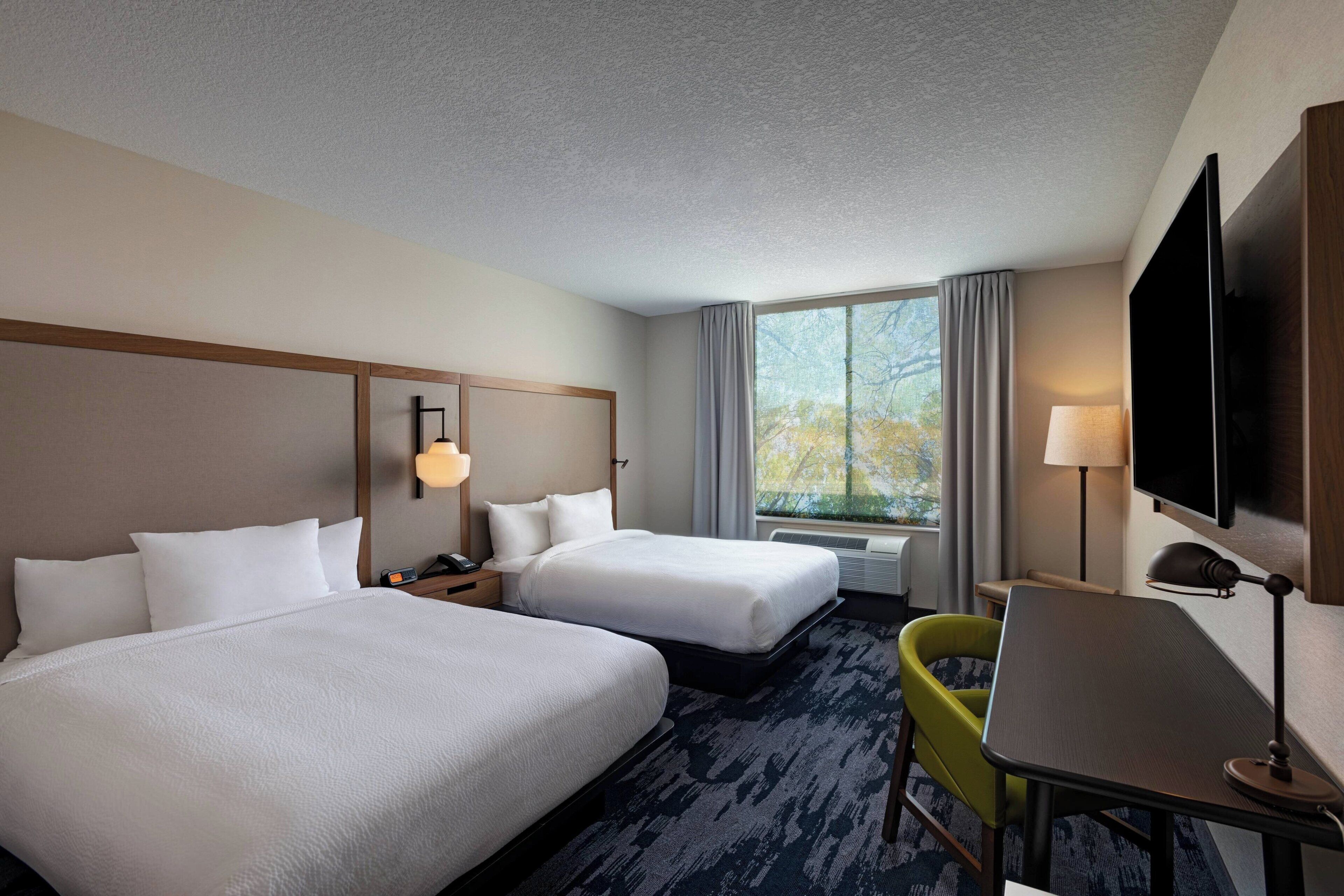 Desk, laptop workspace, blackout drapes, iron/ironing board