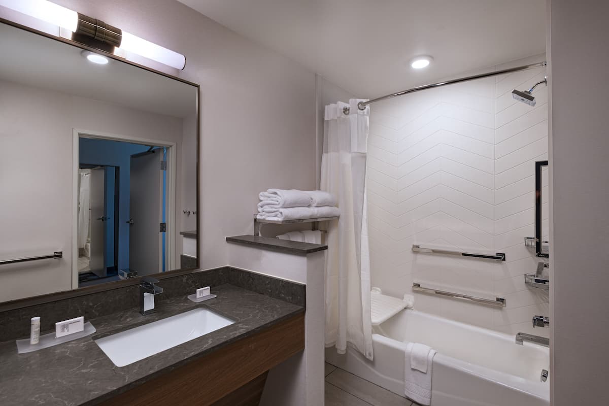 Hair dryer, towels, soap, shampoo