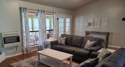 Beautiful Lake Front home w/ sunroom, outdoor patio, hot tub