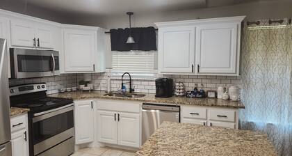 Beautiful Lake Front home w/ sunroom, outdoor patio, hot tub