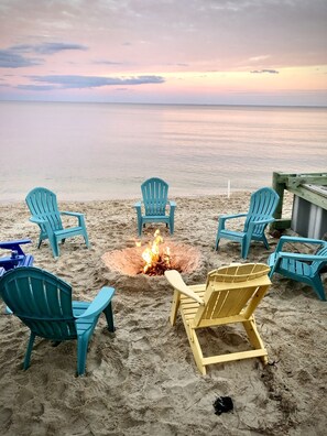 On the beach, sun-loungers, beach towels