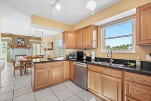 Fridge, microwave, oven, stovetop - Charming Longboat Village Hideaway–2BR in a Quiet Coastal Neighborhood by RVA (Longboat Key)